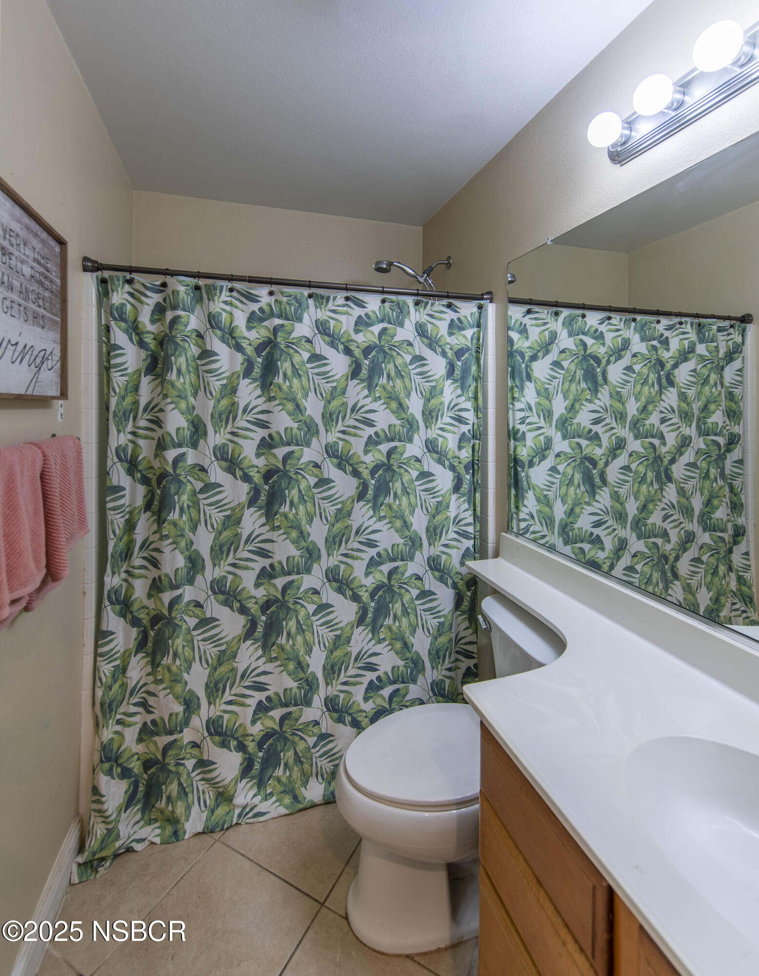 2324 Carrizo Lompoc, CA 93436 - Photo 20 of 62 a bathroom with a toilet a sink and a large mirror