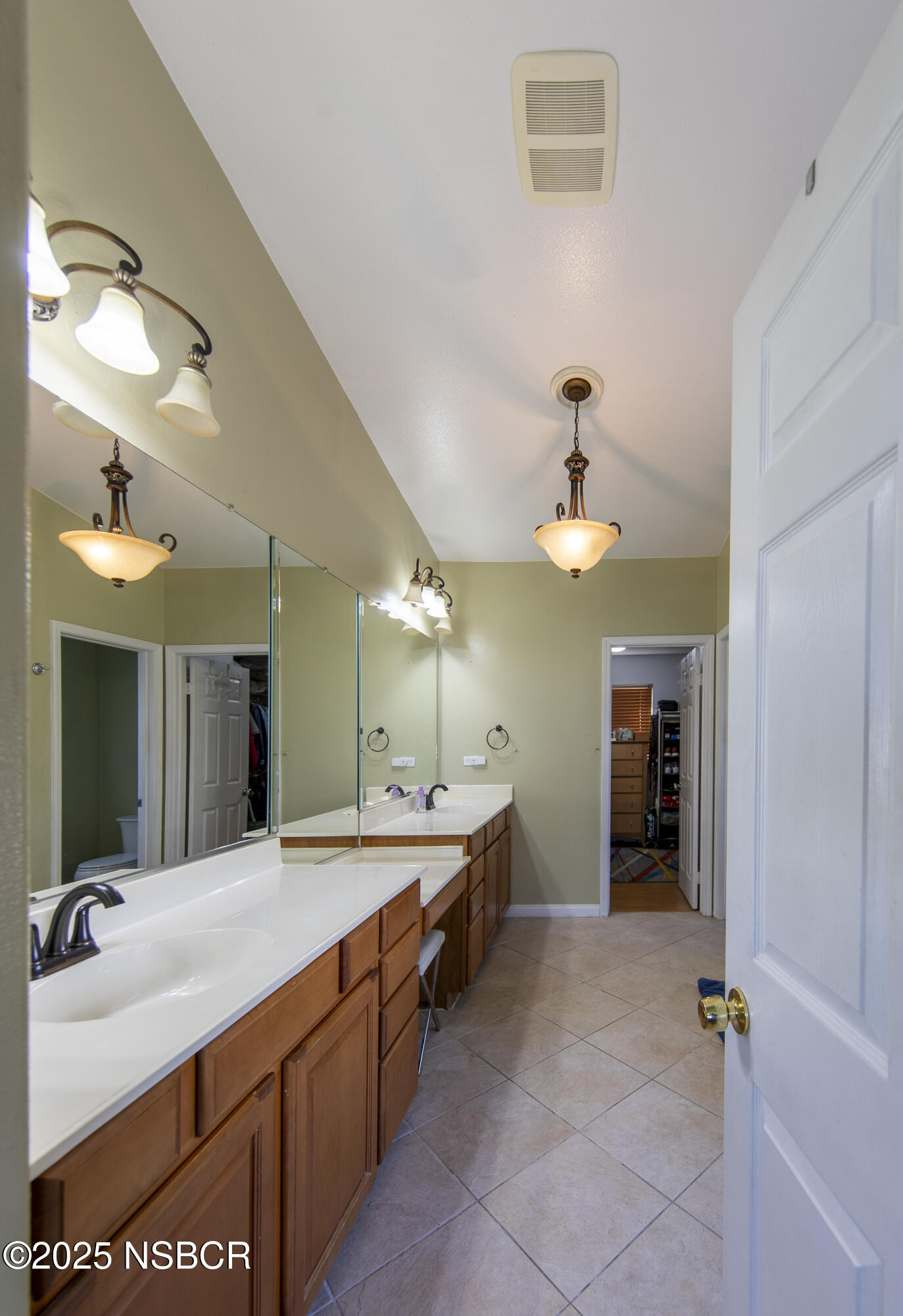 2324 Carrizo Lompoc, CA 93436 - Photo 27 of 62 a bathroom with a double vanity sink and a mirror