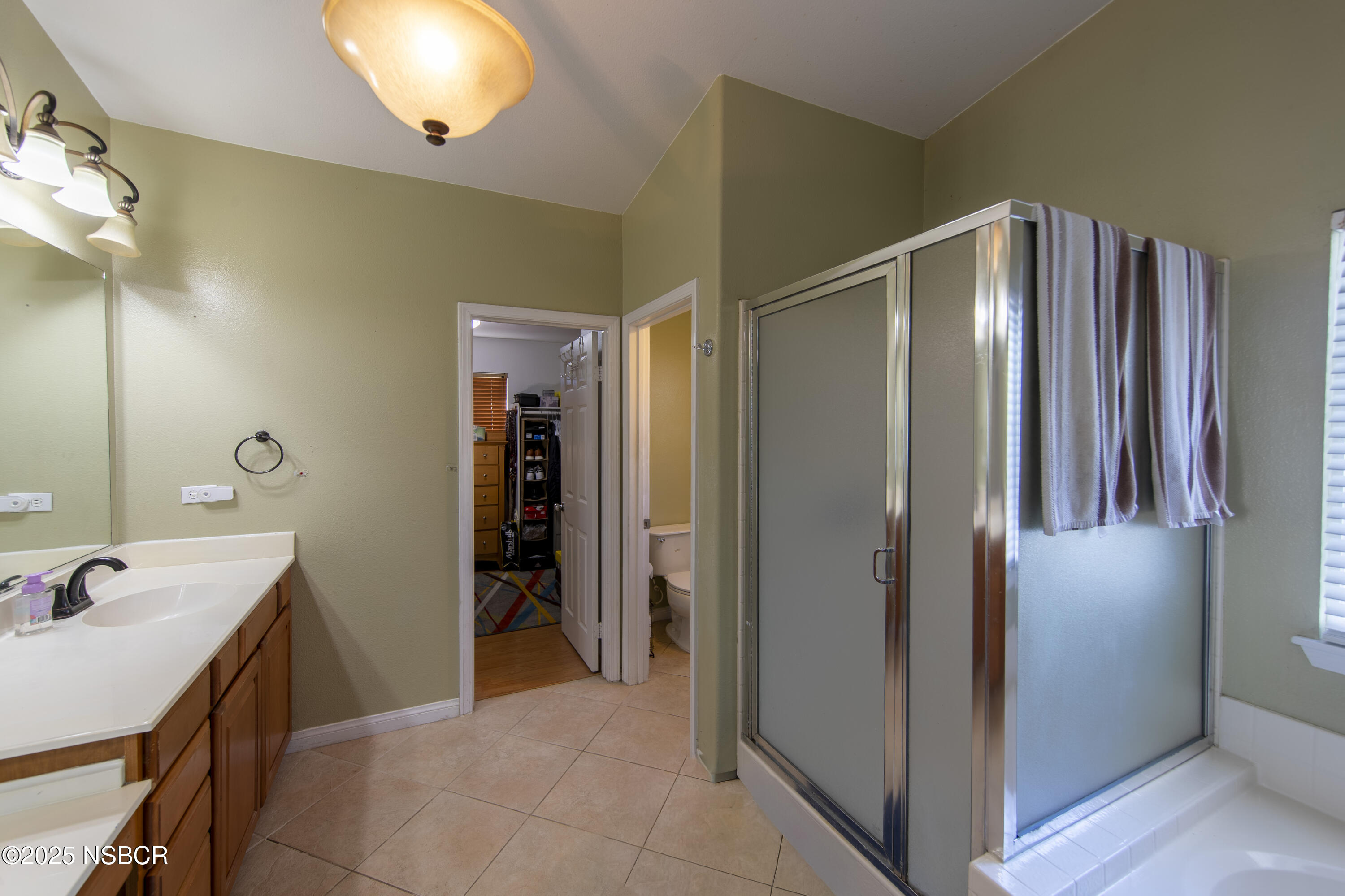 2324 Carrizo Lompoc, CA 93436 - Photo 31 of 62 a bathroom with a sink and a mirror