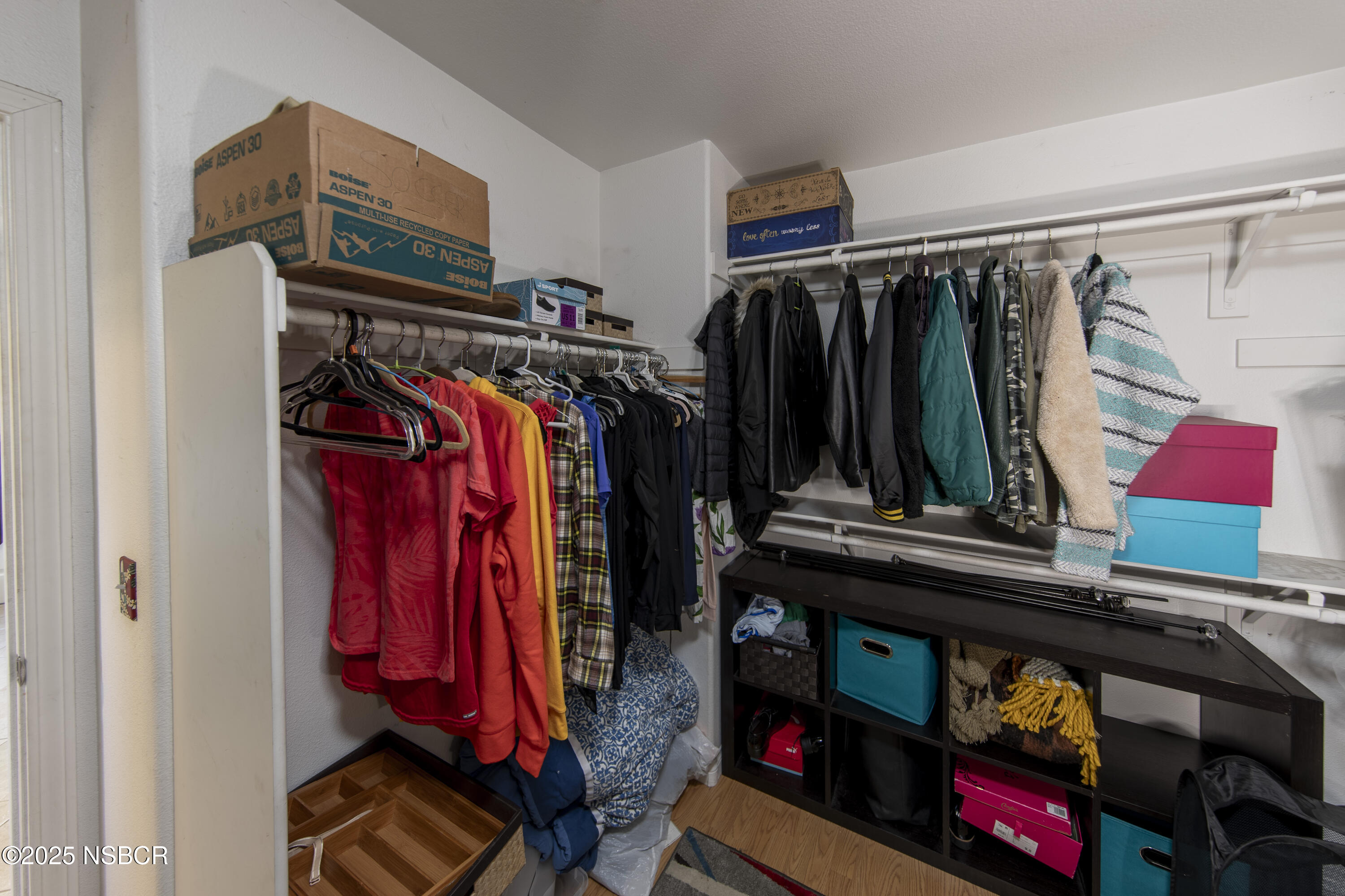 2324 Carrizo Lompoc, CA 93436 - Photo 33 of 62 a view of walk in closet with clothes and shoes