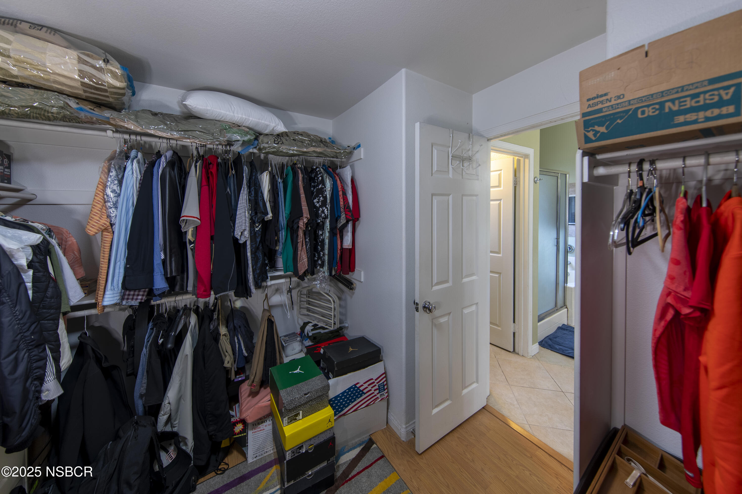 2324 Carrizo Lompoc, CA 93436 - Photo 34 of 62 a view of walk in closet with clothes and shoes