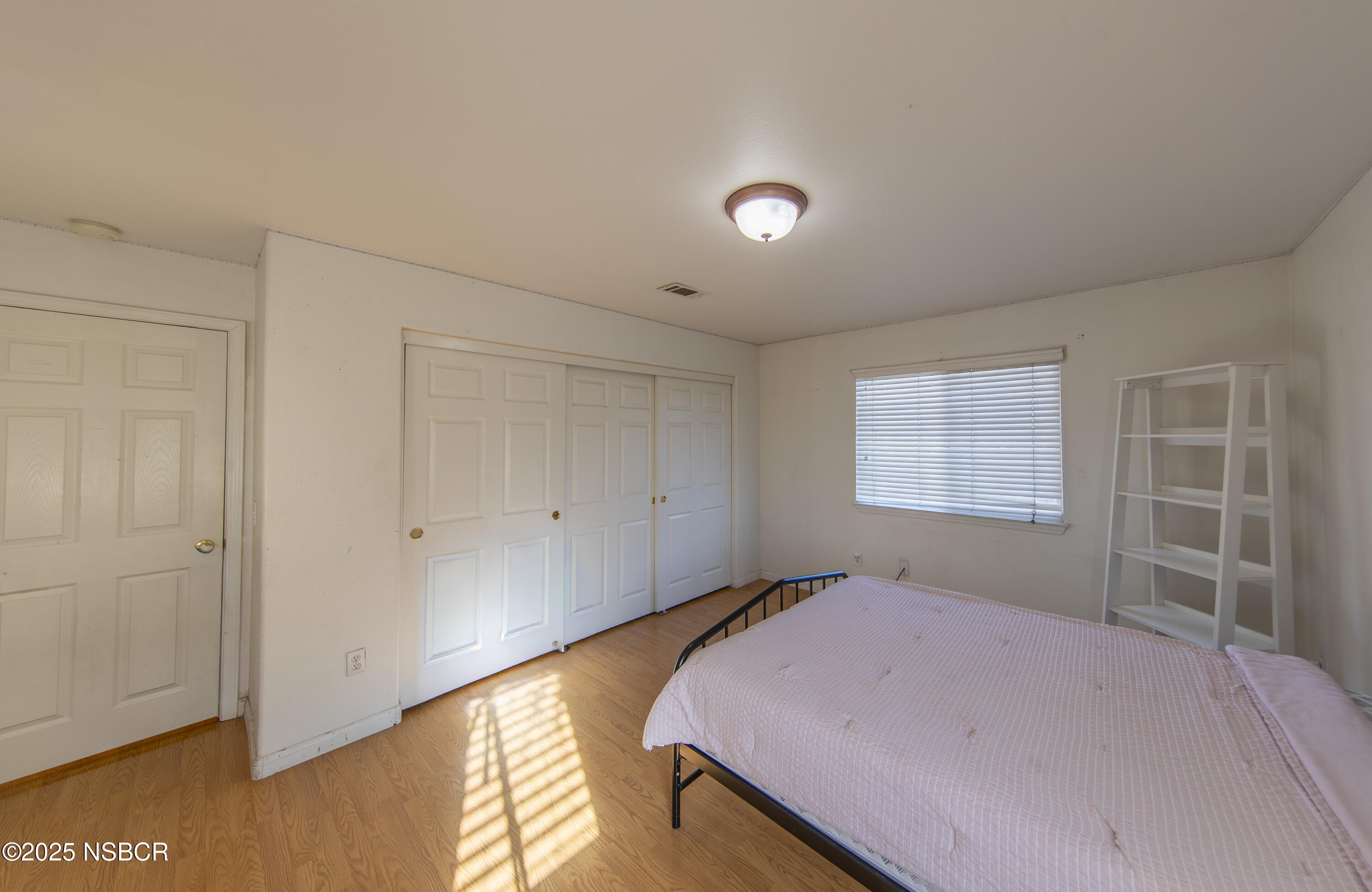 2324 Carrizo Lompoc, CA 93436 - Photo 39 of 62 a bedroom with a bed and a window