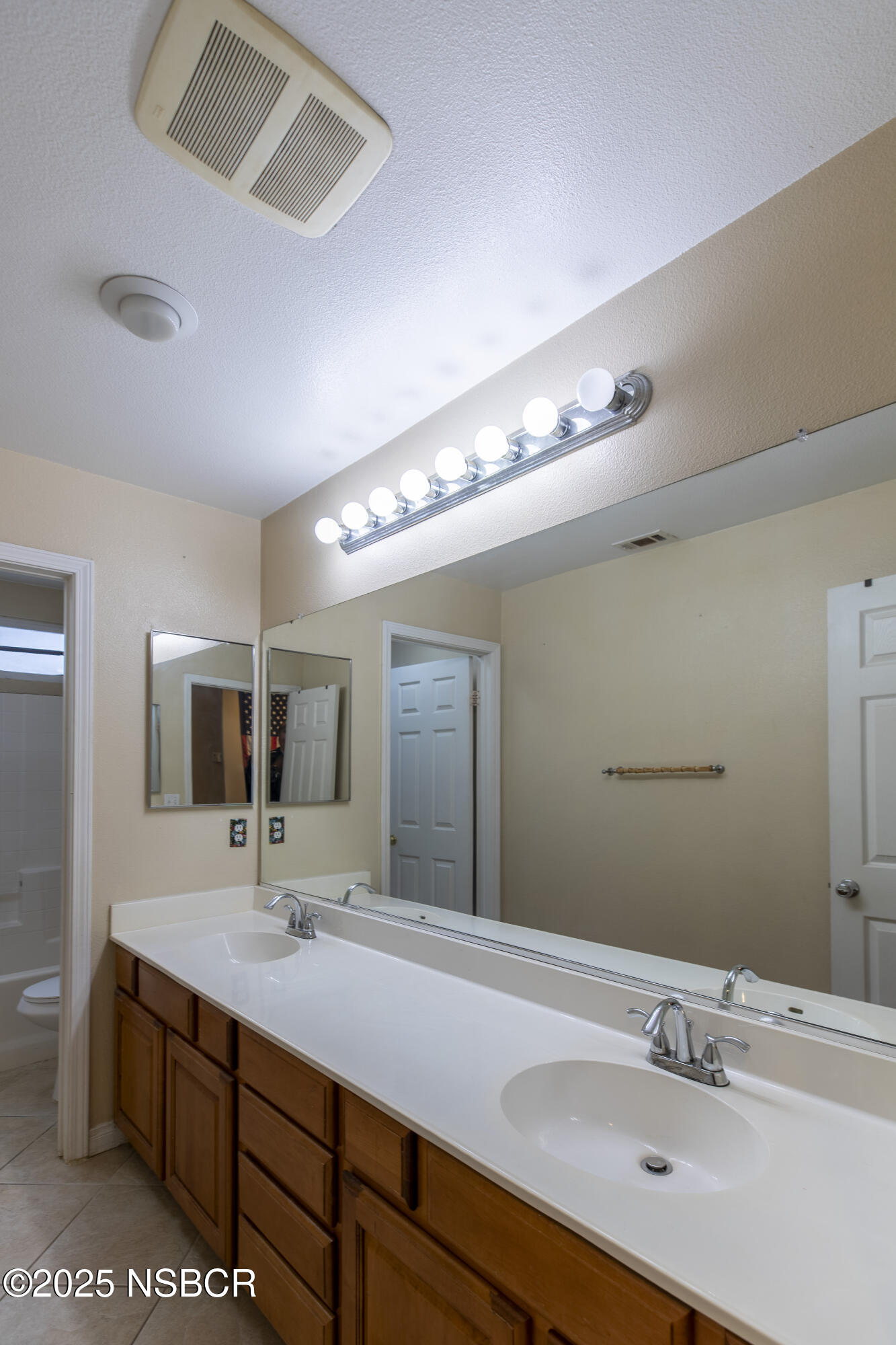 2324 Carrizo Lompoc, CA 93436 - Photo 42 of 62 a bathroom with a sink double vanity and a mirror
