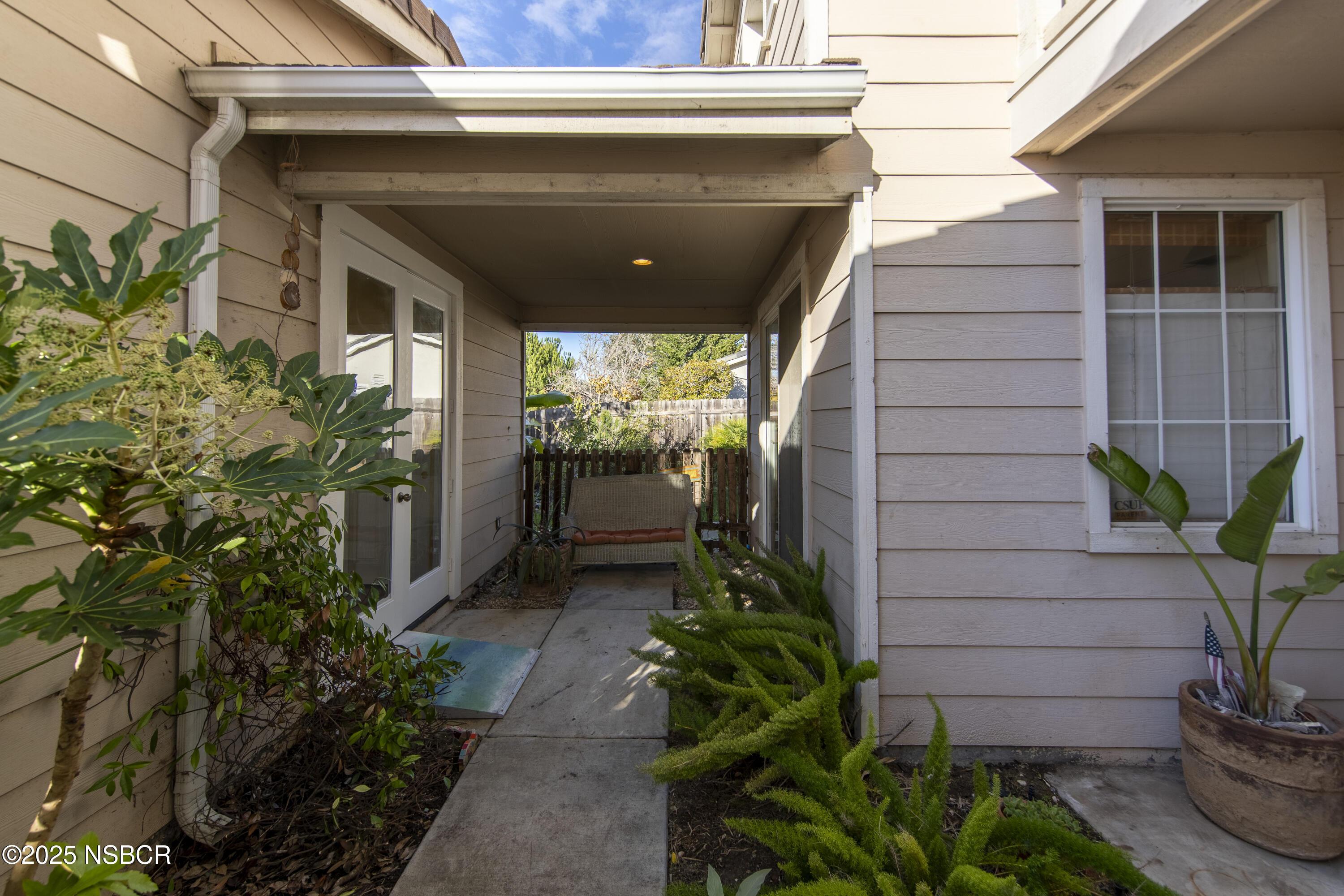 2324 Carrizo Lompoc, CA 93436 - Photo 56 of 62 a potted plant sitting in front of a house