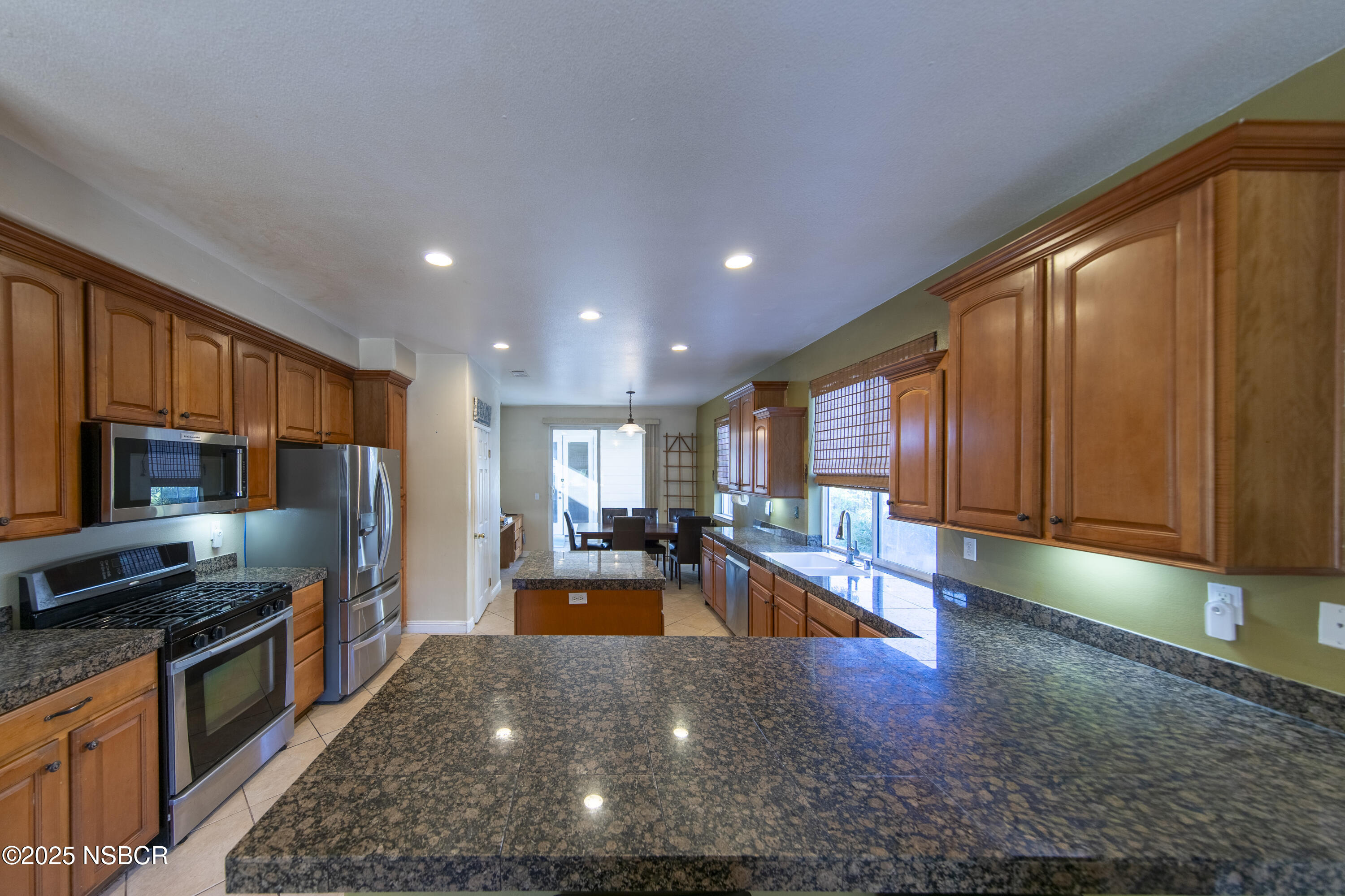 2324 Carrizo Lompoc, CA 93436 - Photo 9 of 62 a large kitchen with stainless steel appliances a large window in it