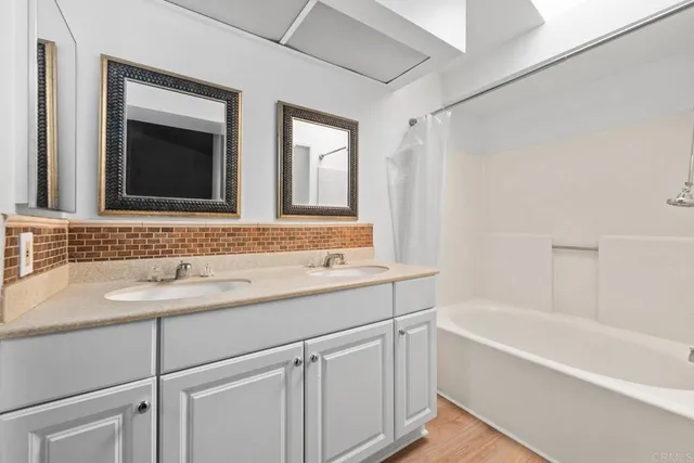 a bathroom with a sink and a bathtub