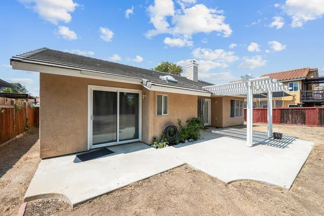 a view of a house with a sitting space