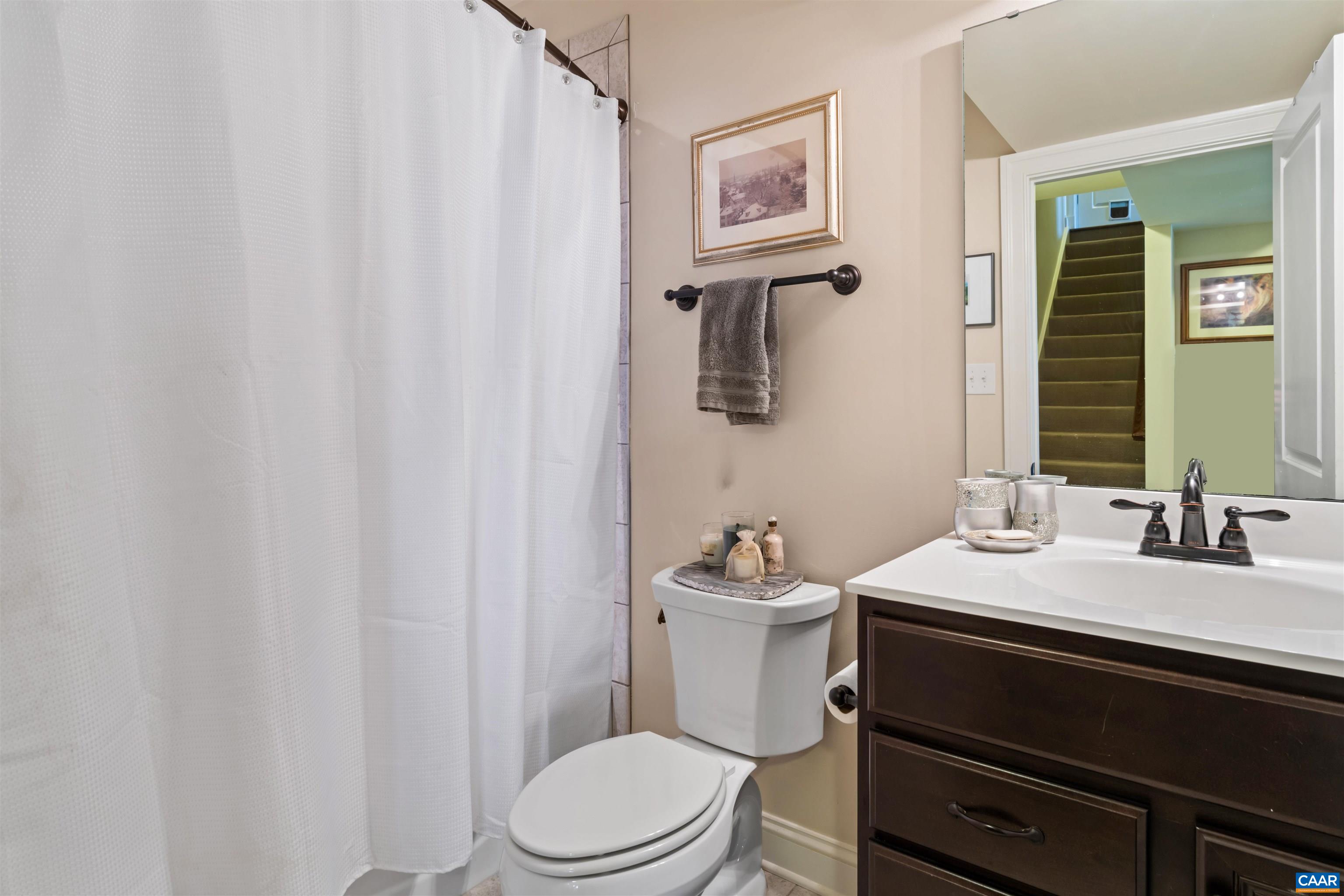 2246 Hyland Ridge Drive Charlottesville, VA 22911 - Photo 36 of 53 a bathroom with a sink a toilet and a mirror