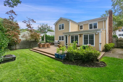 a house view with a garden space