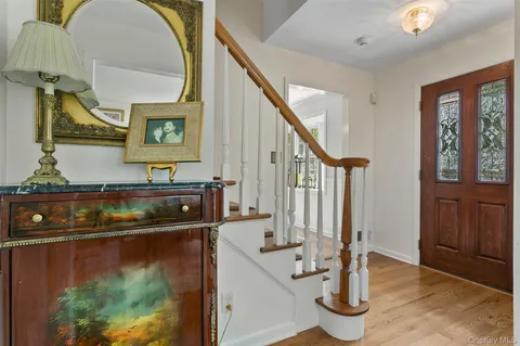 a view of living room with furniture and floor to ceiling window