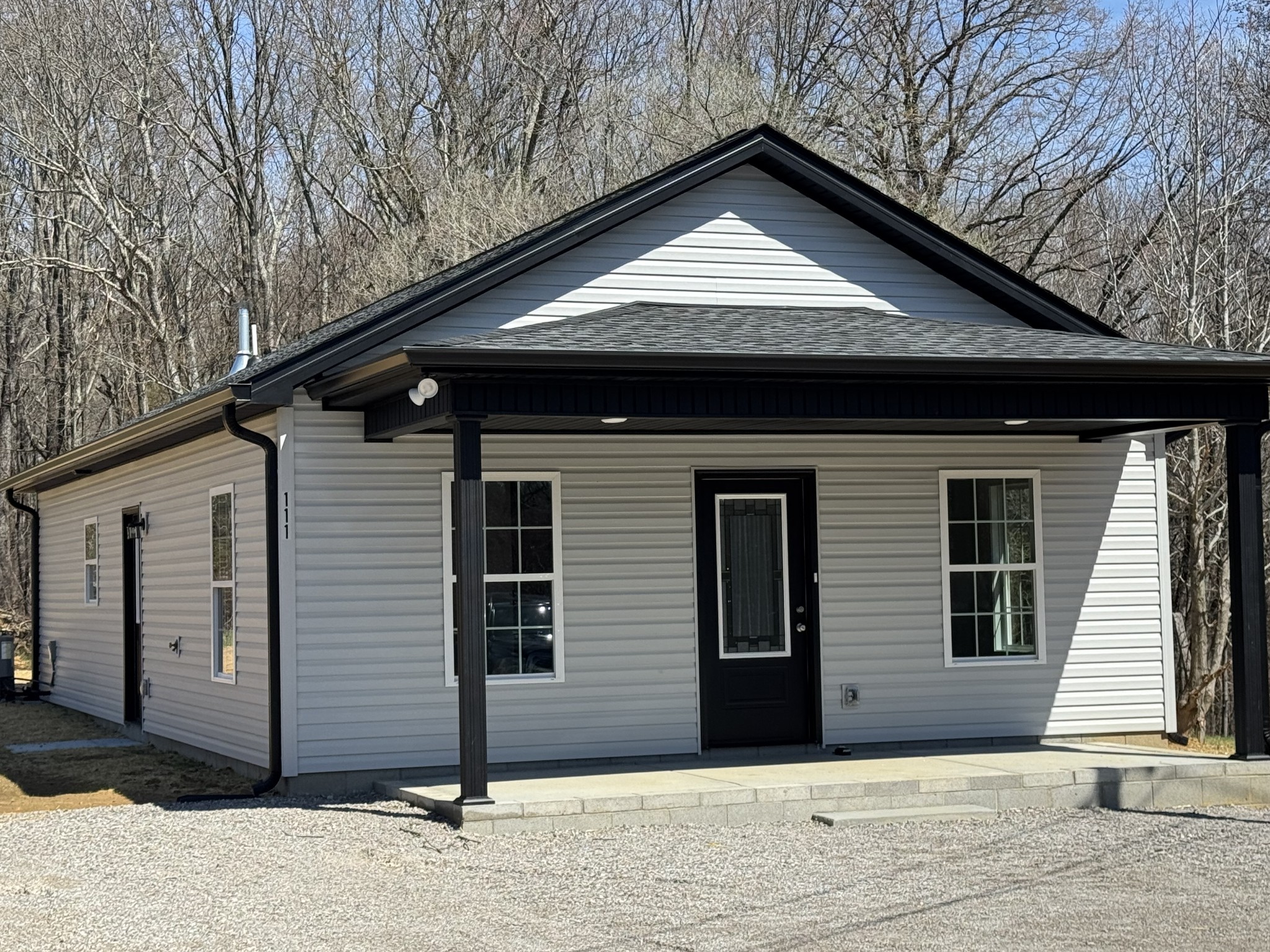 111 White Lane Portland, TN 37148 - Photo 2 of 9 a view of a house with a wooden fence