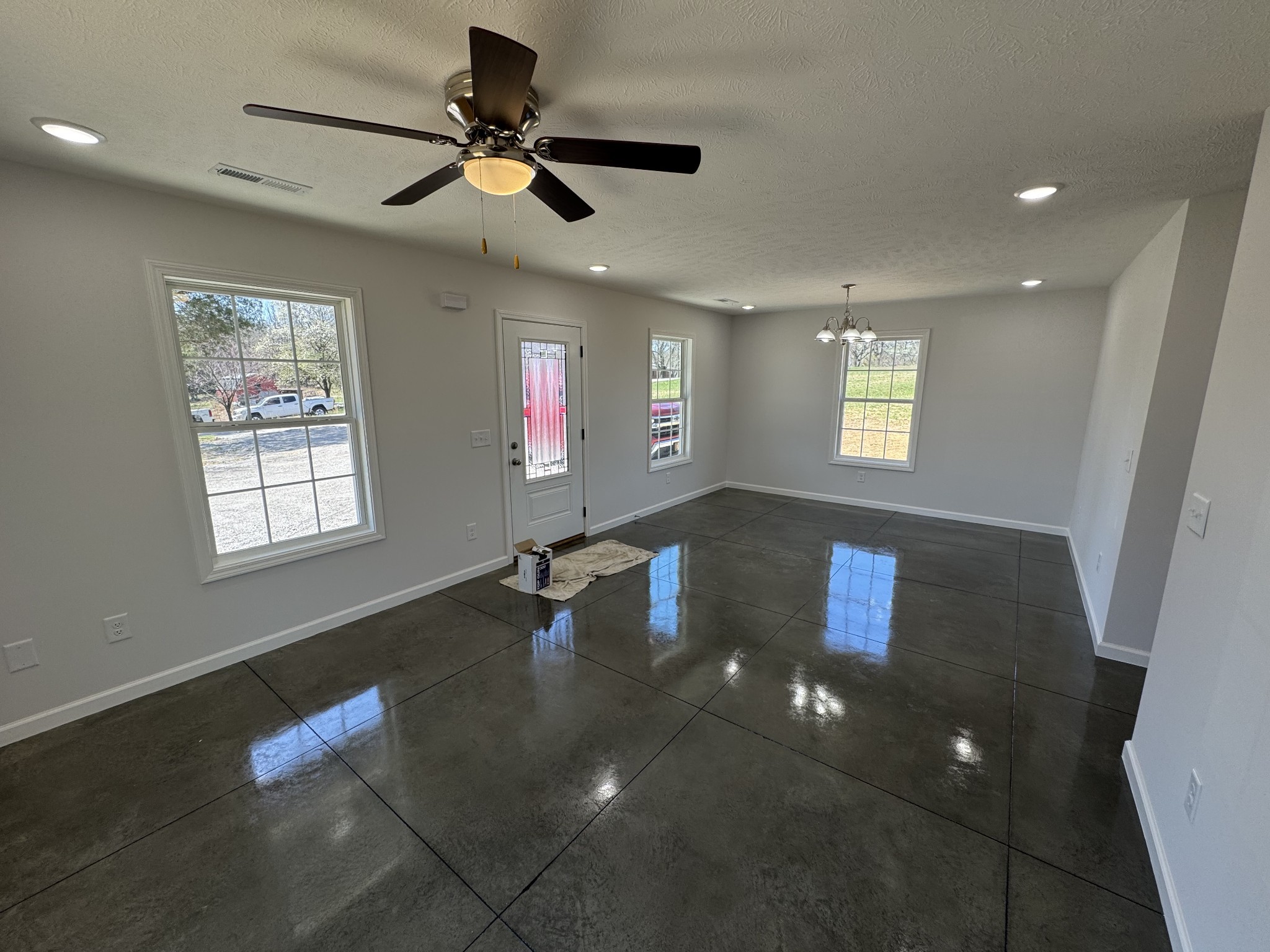 111 White Lane Portland, TN 37148 - Photo 5 of 9 a view of an empty room with a window and wooden floor
