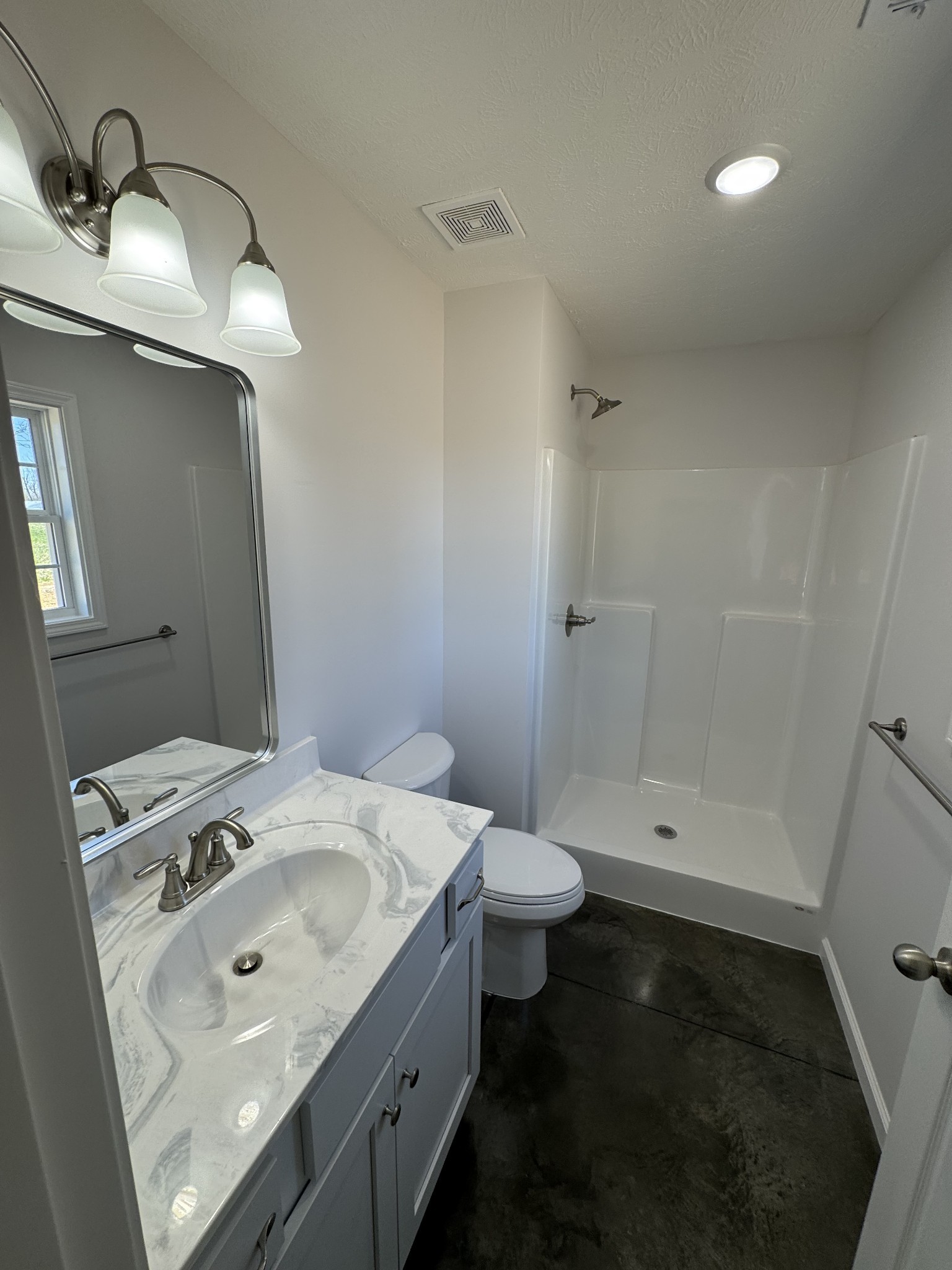 111 White Lane Portland, TN 37148 - Photo 9 of 9 a bathroom with a granite countertop sink toilet and shower