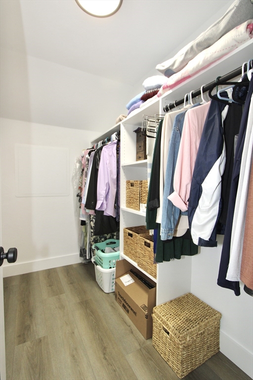 10 Salisbury Hill Boulevard, Unit 75 Worcester, MA 01609 - Photo 21 of 29 a view of walk in closet with clothes and shoes