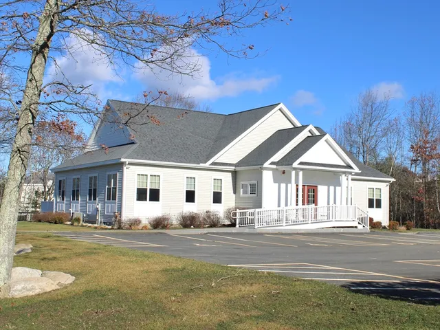 a front view of a house with swimming pool