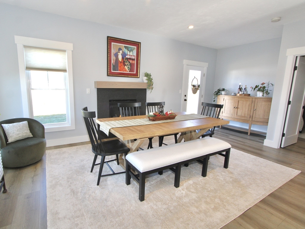 10 Salisbury Hill Boulevard, Unit 75 Worcester, MA 01609 - Photo 5 of 29 a outdoor living space with furniture and a fireplace