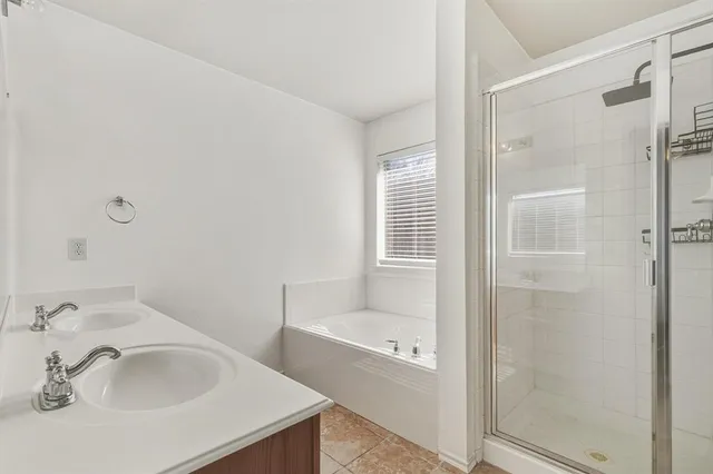 a bathroom with a sink and a bathtub