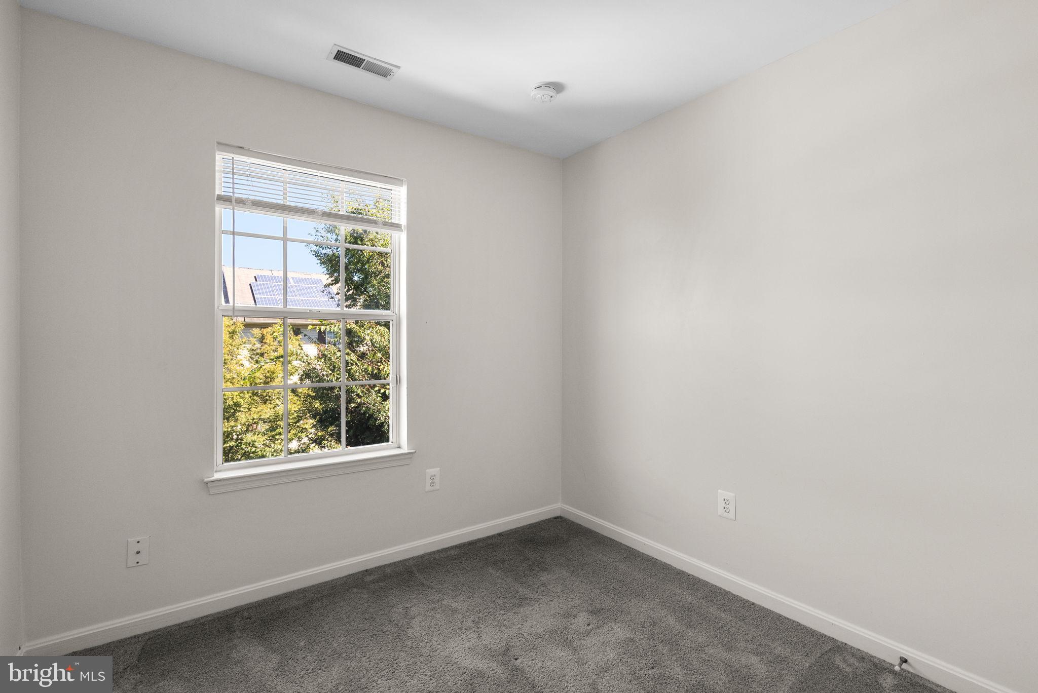 6710 Tranquil Way Elkridge, MD 21075 - Photo 31 of 49 an empty room with windows