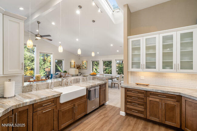 2522 Lake Ridge Shores Circle Reno, NV 89519 - Photo 15 of 50 a large kitchen with granite countertop a large counter top appliances and cabinets