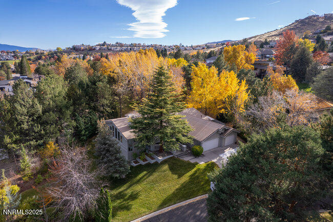 2522 Lake Ridge Shores Circle Reno, NV 89519 - Photo 2 of 50 an aerial view of residential houses with outdoor space
