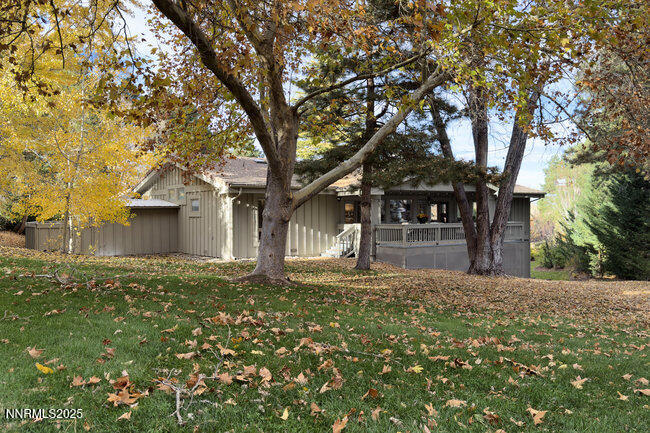 2522 Lake Ridge Shores Circle Reno, NV 89519 - Photo 43 of 50 a front view of a house with garden
