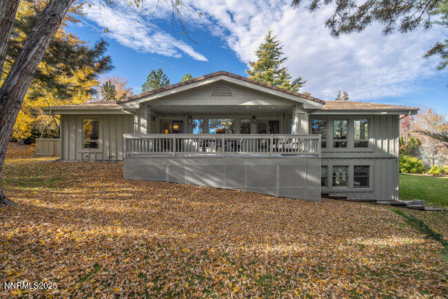 2522 Lake Ridge Shores Circle Reno, NV 89519 - Photo 45 of 50 front view of a house with a yard