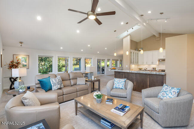 2522 Lake Ridge Shores Circle Reno, NV 89519 - Photo 7 of 50 a living room with furniture and a large window