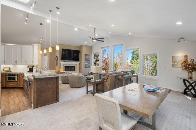 2522 Lake Ridge Shores Circle Reno, NV 89519 - Photo 10 of 50 a large kitchen with a table and chairs