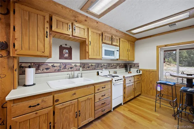 a room with furniture and pool table