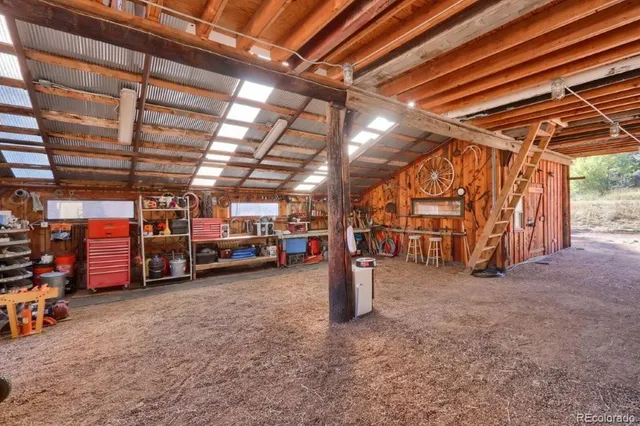 a view of an empty room with storage