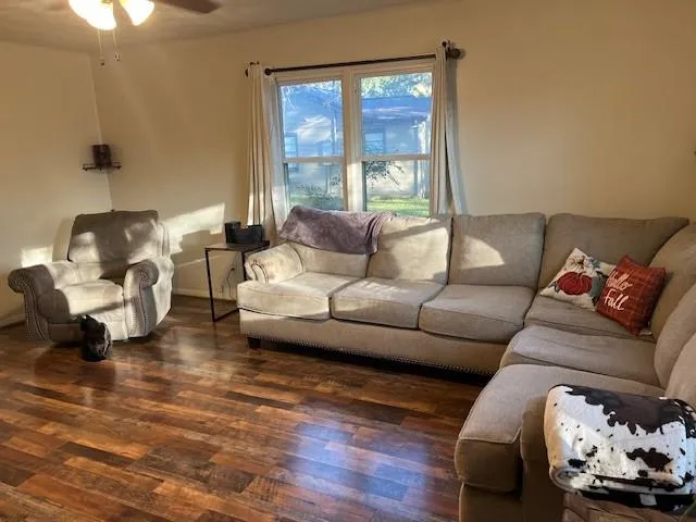 a kitchen with a stove cabinets and window