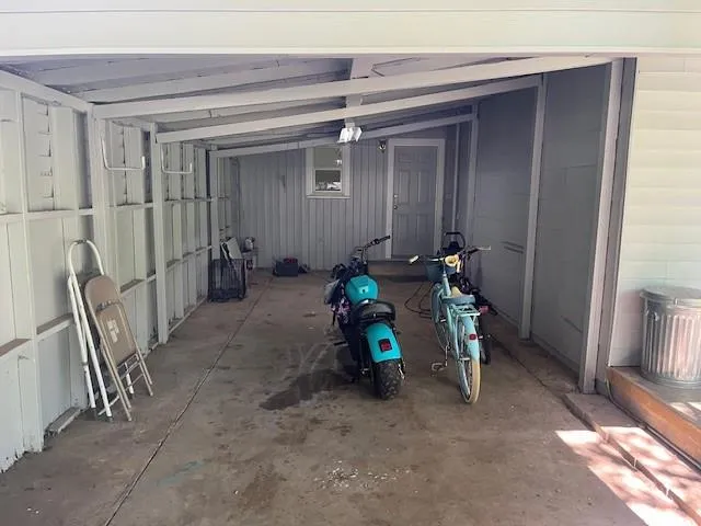 a bathroom with a toilet and shower