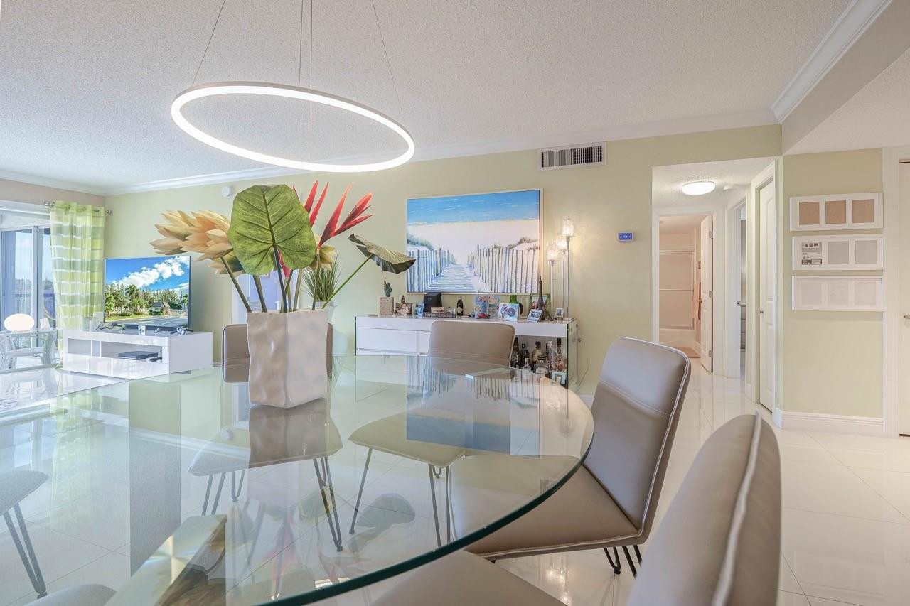 3930 Inverrary Boulevard, Unit 603D Lauderhill, FL 33319 - Photo 16 of 74 a view of a dining room with furniture