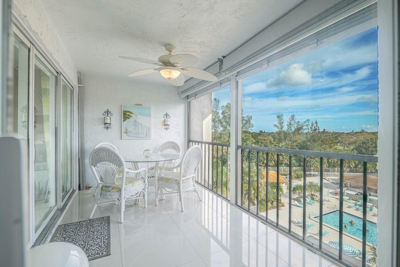 3930 Inverrary Boulevard, Unit 603D Lauderhill, FL 33319 - Photo 4 of 74 a view of a dining room with furniture window and outside view
