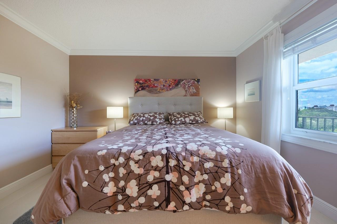 3930 Inverrary Boulevard, Unit 603D Lauderhill, FL 33319 - Photo 42 of 74 a bedroom with a bed and a window