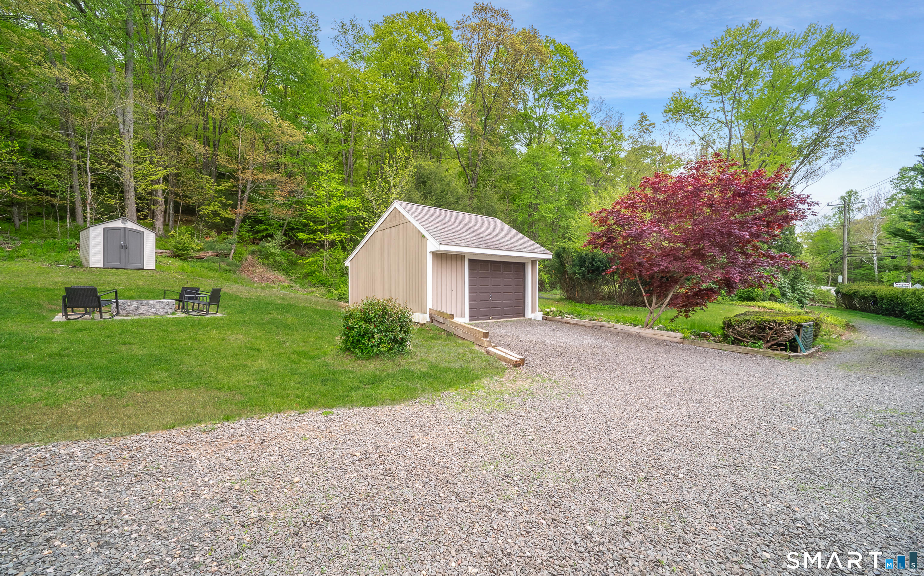 230 Killingworth Road Haddam, CT 06441 - Photo 34 of 36 a front view of a house with a yard and garage