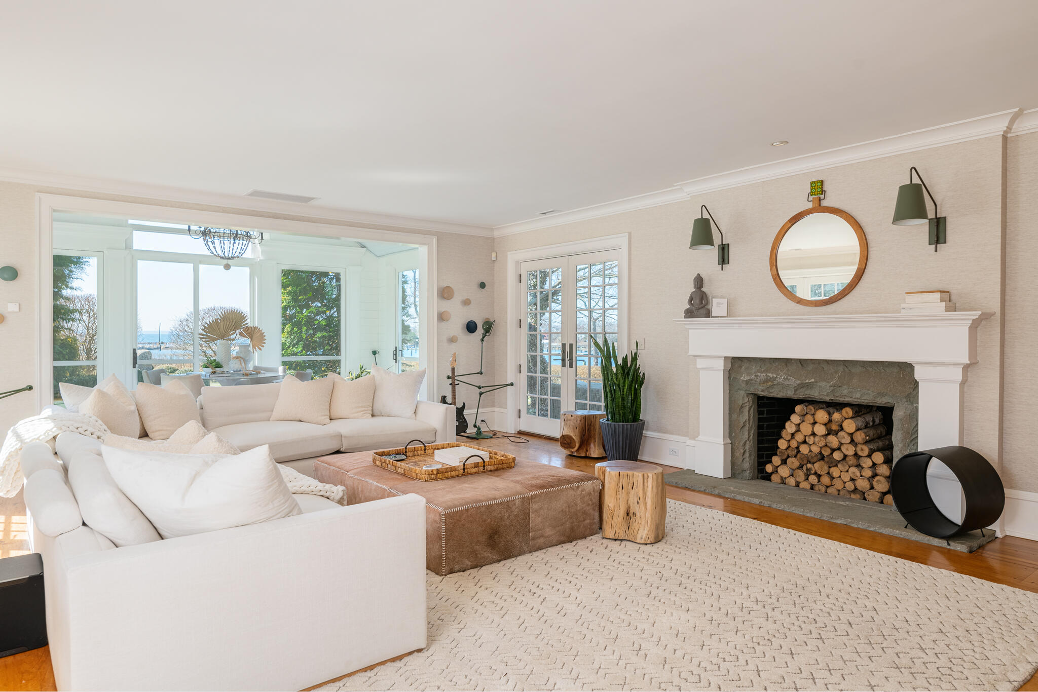 98 Pear Tree Point Road Darien, CT 06820 - Photo 13 of 42 a living room with furniture and a fireplace