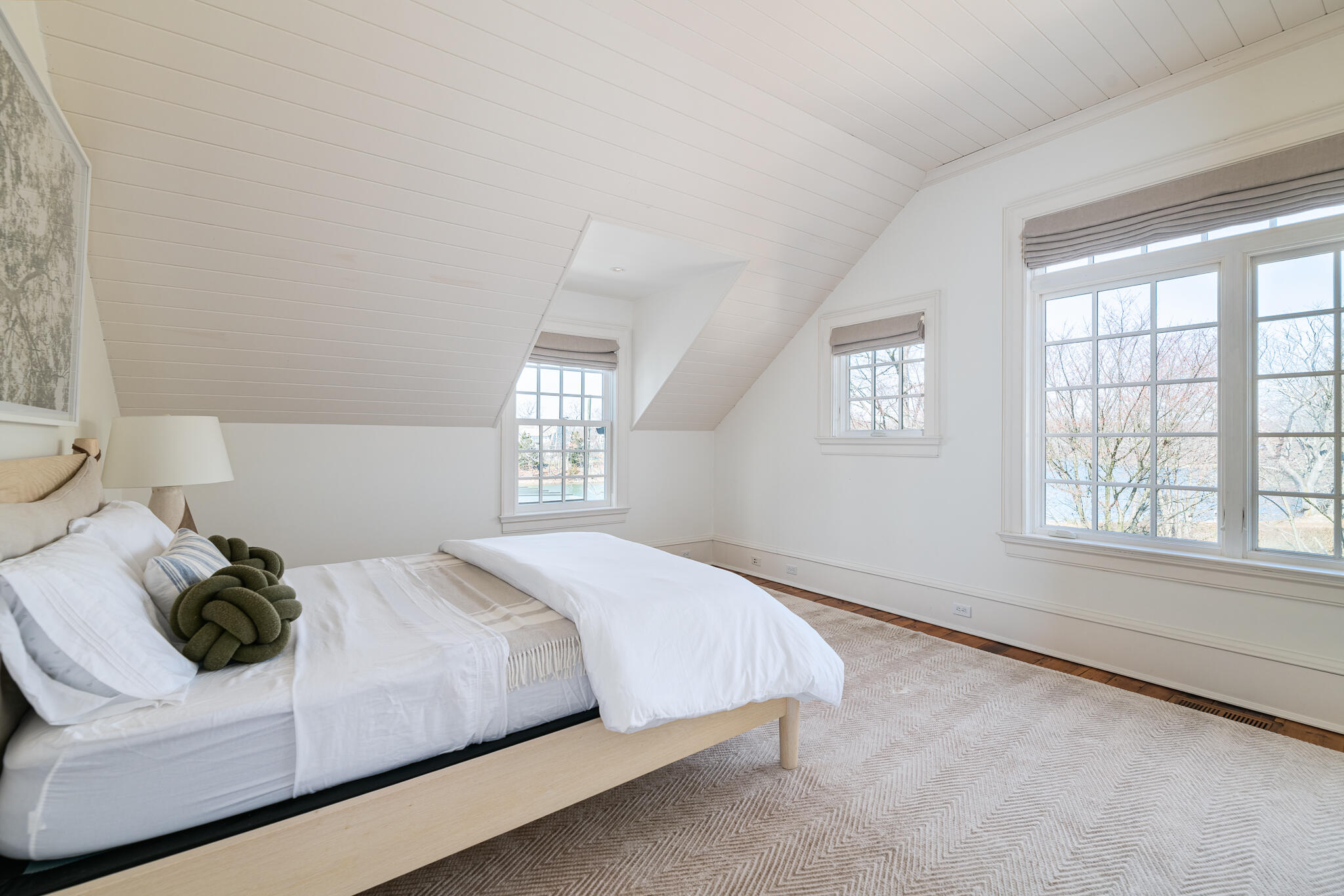 98 Pear Tree Point Road Darien, CT 06820 - Photo 32 of 42 a bedroom with a bed and a window