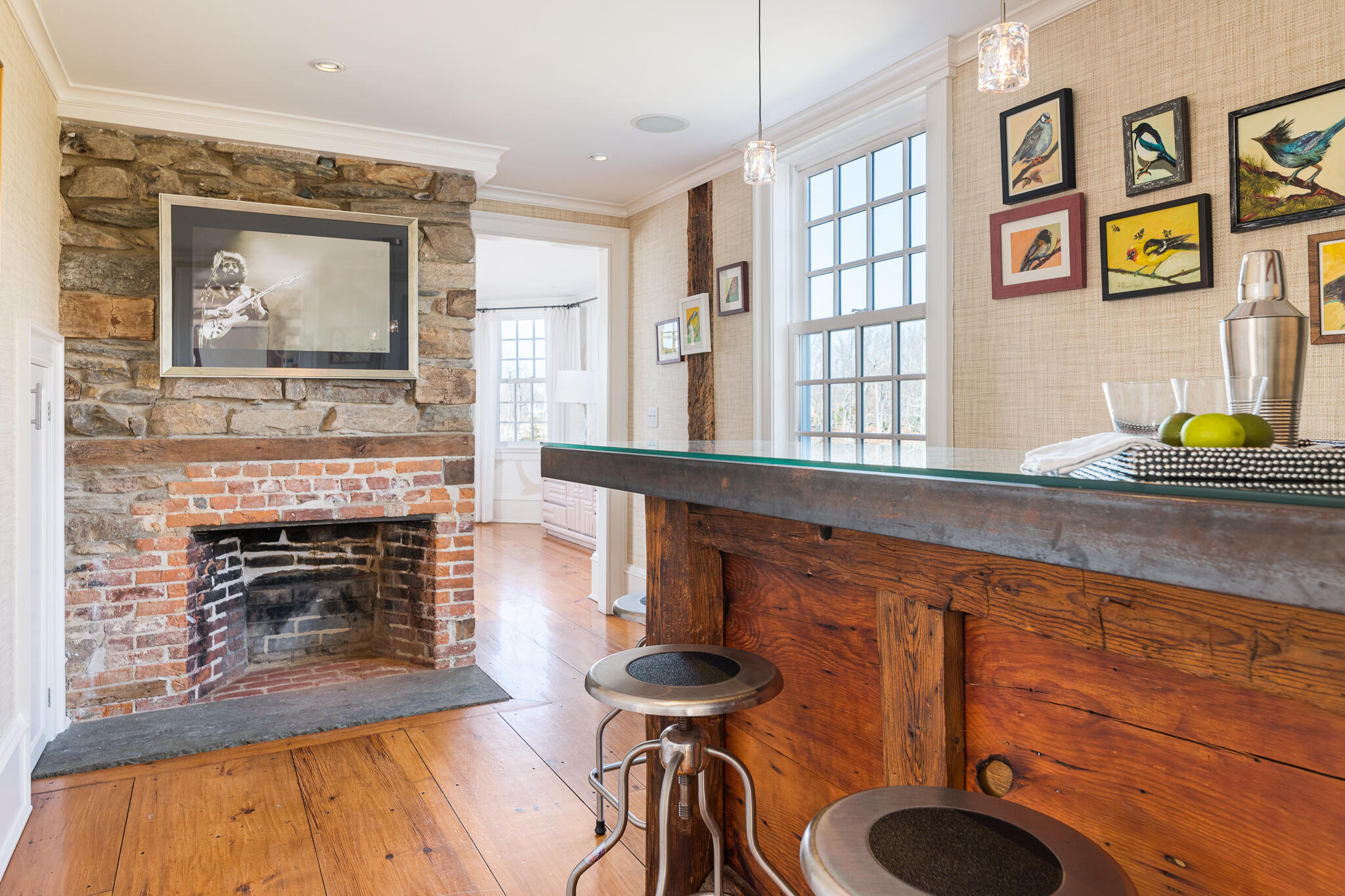 98 Pear Tree Point Road Darien, CT 06820 - Photo 5 of 42 a living room with furniture and a fireplace