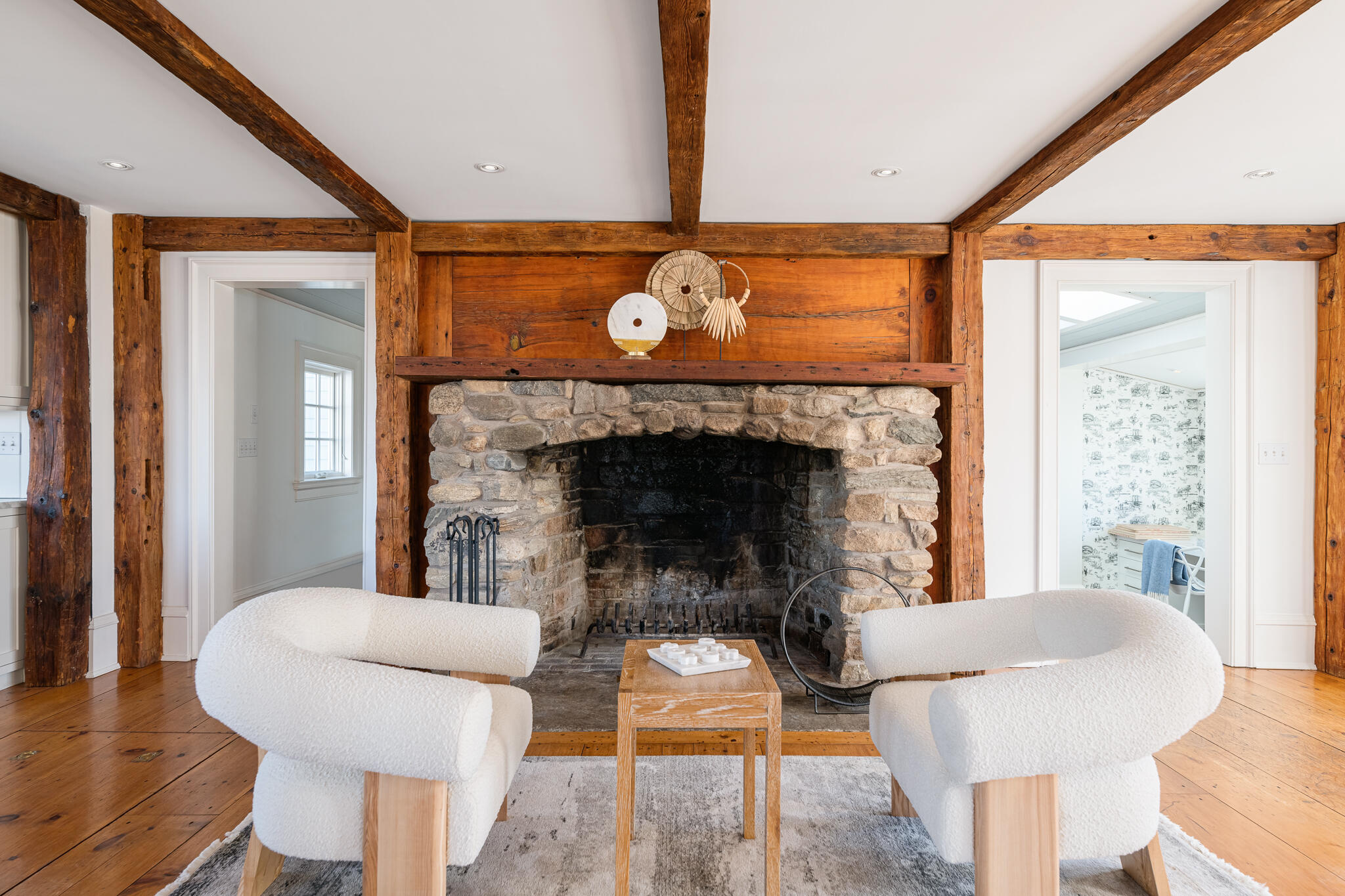 98 Pear Tree Point Road Darien, CT 06820 - Photo 9 of 42 a living room with furniture and a fireplace