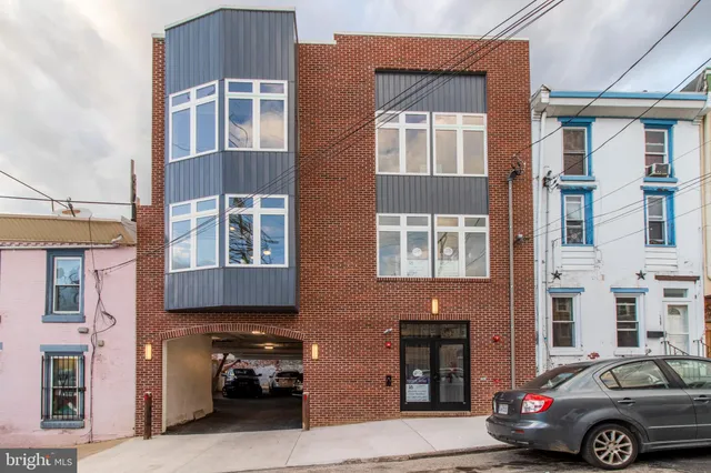 a car parked in front of a building