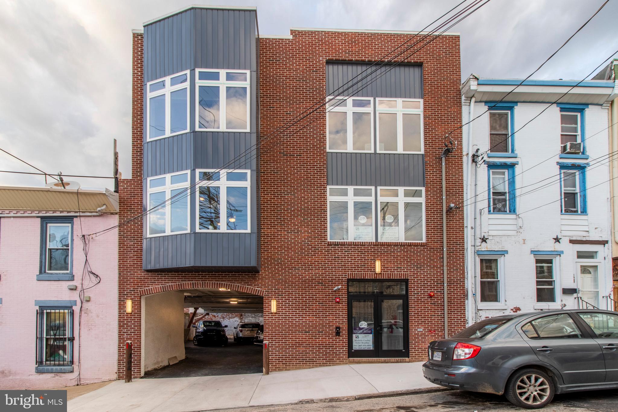 a car parked in front of a building