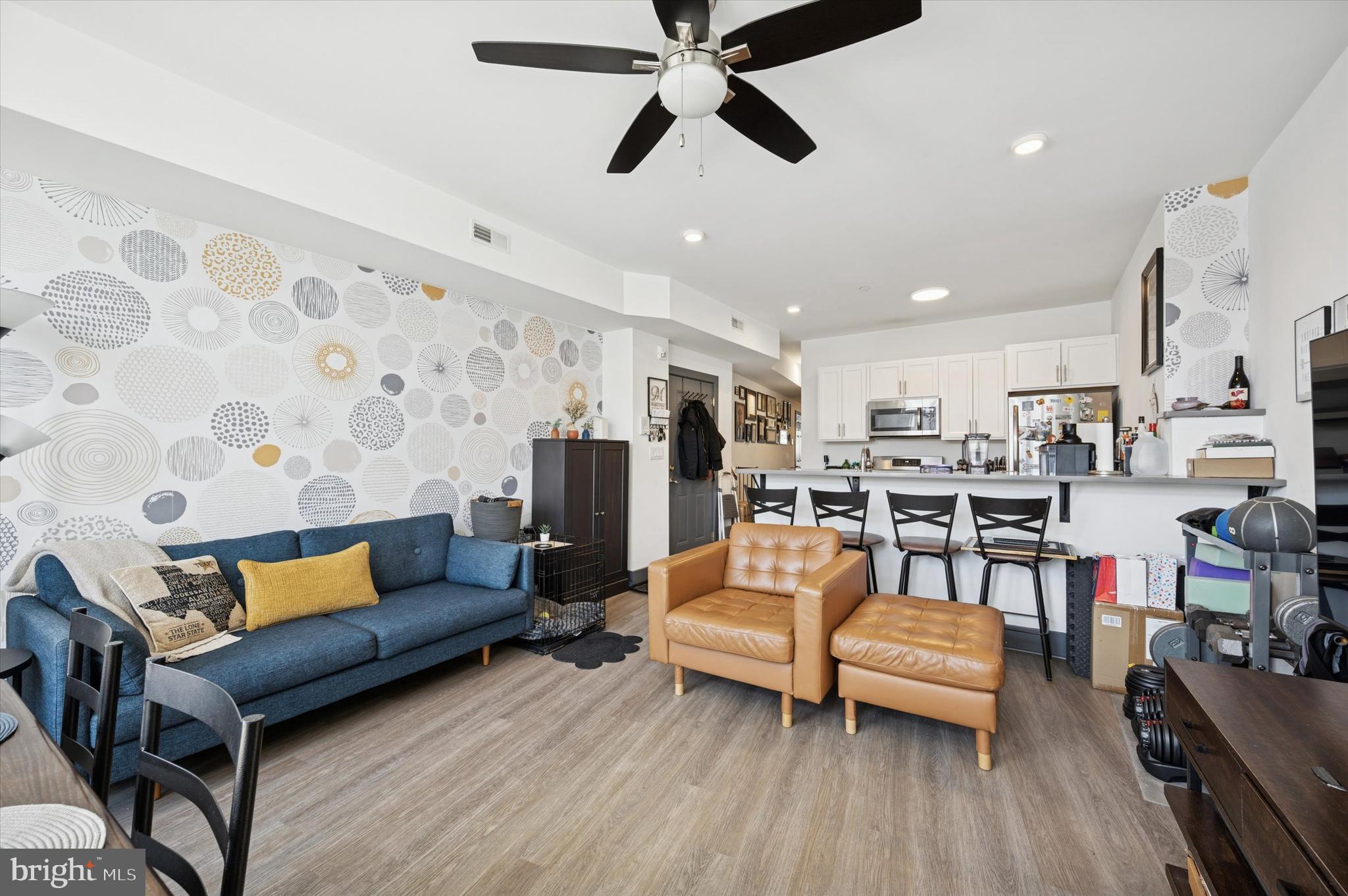 124-28 Levering Street, Unit 2B Philadelphia, PA 19127 - Photo 4 of 21 a living room with furniture and kitchen view