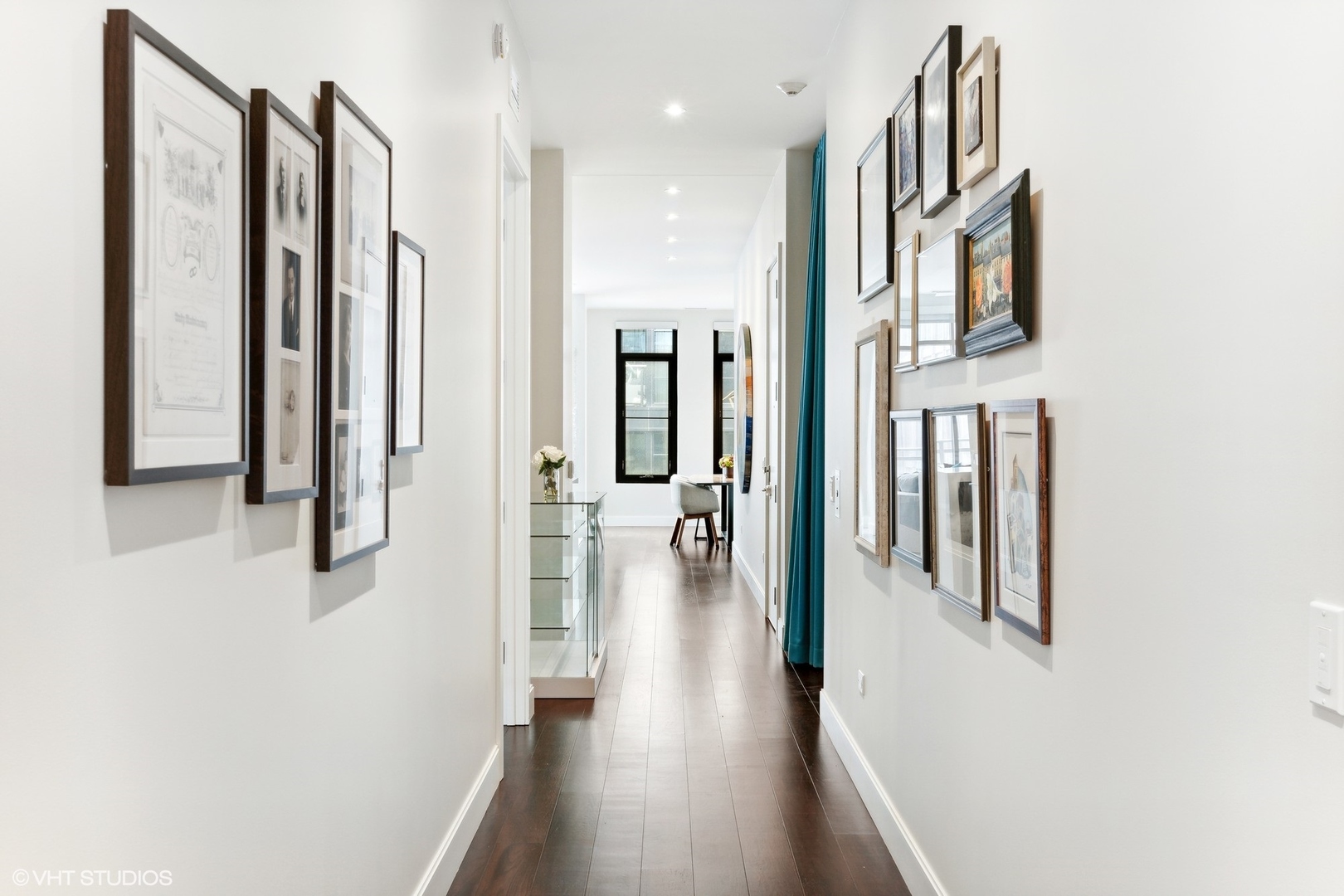 35 North Aberdeen Street, Unit PHS Chicago, IL 60607 - Photo 12 of 38 a view of a hallway with wooden floor and staircase