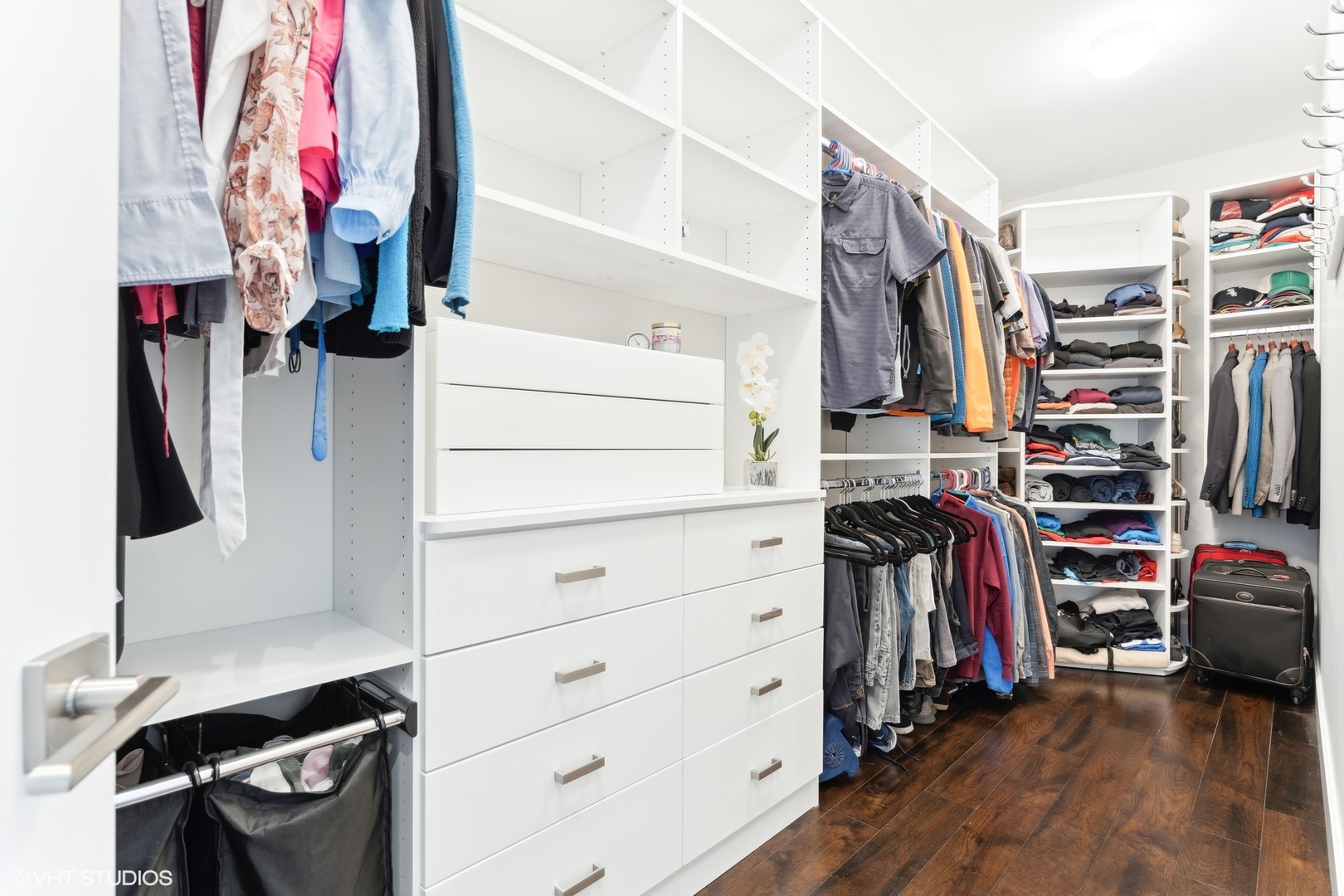 35 North Aberdeen Street, Unit PHS Chicago, IL 60607 - Photo 15 of 38 a view of walk in closet with clothes and shoes