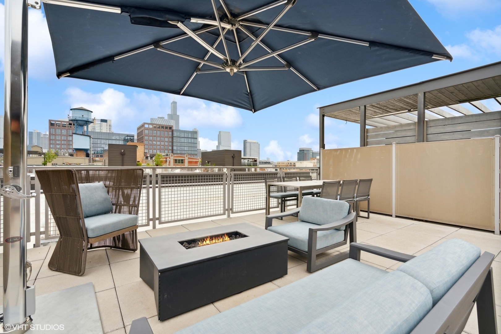 35 North Aberdeen Street, Unit PHS Chicago, IL 60607 - Photo 34 of 38 a patio view with a table and chairs