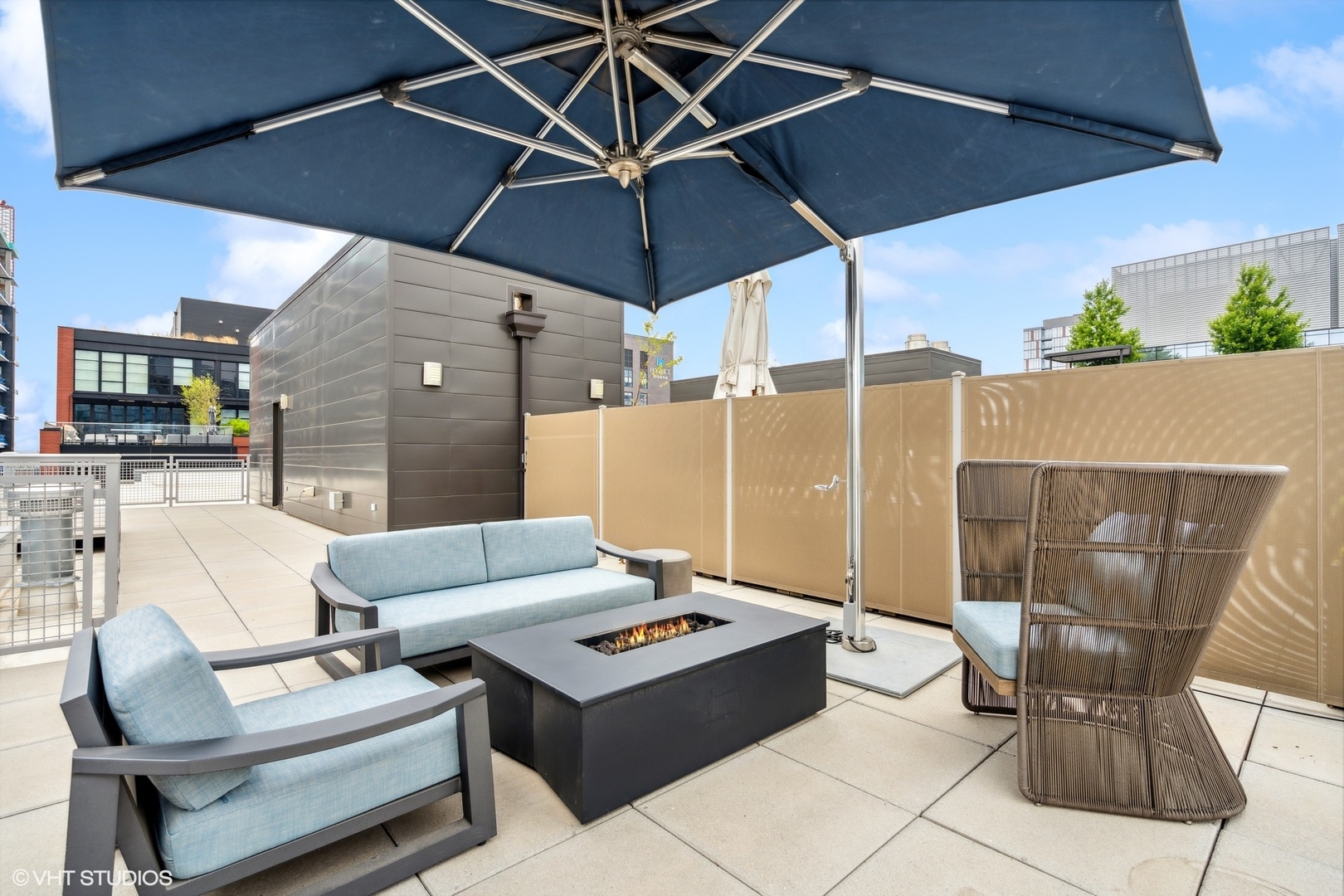 35 North Aberdeen Street, Unit PHS Chicago, IL 60607 - Photo 36 of 38 a outdoor space with patio the couches and a potted plant