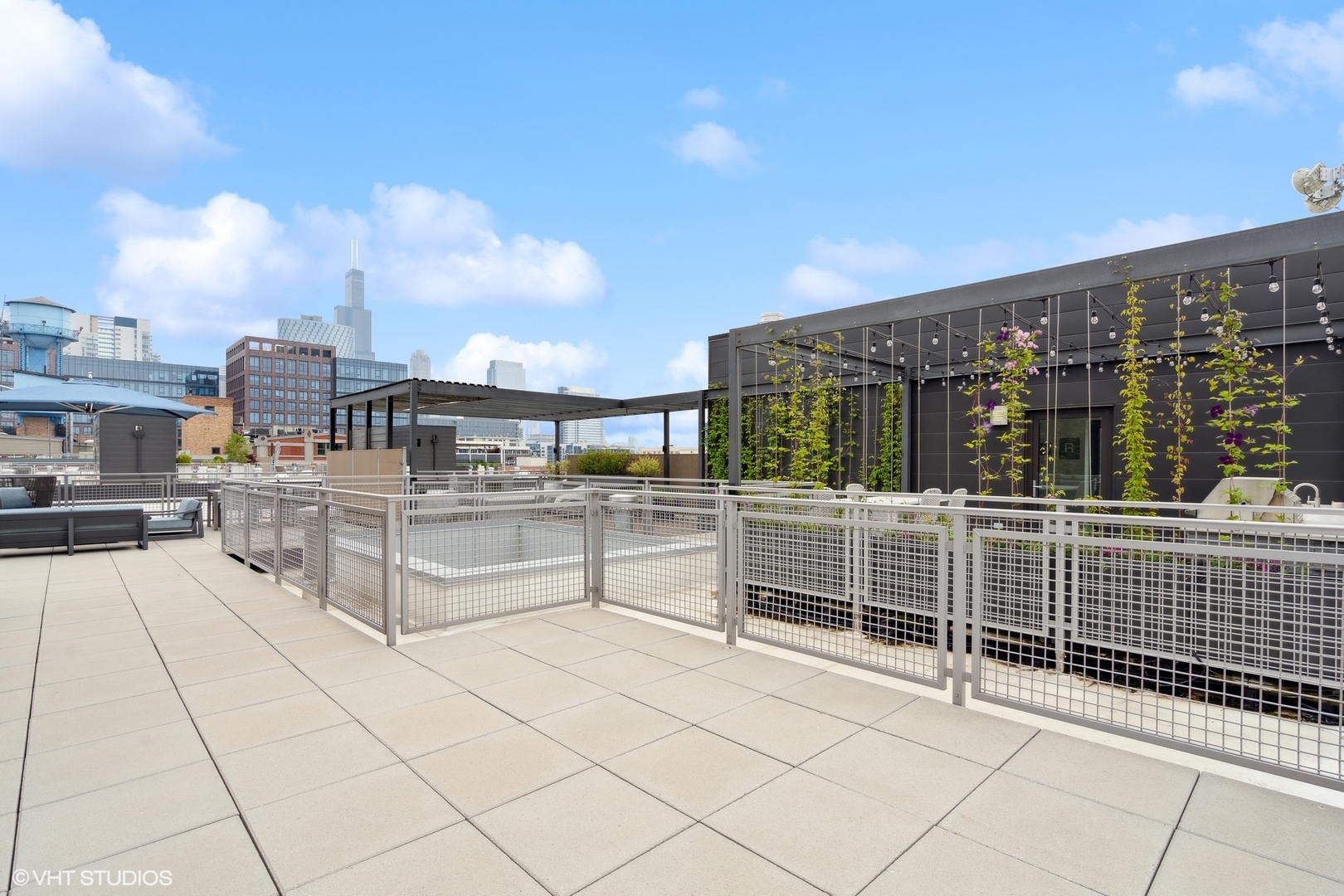 35 North Aberdeen Street, Unit PHS Chicago, IL 60607 - Photo 38 of 38 a view of a terrace with chairs