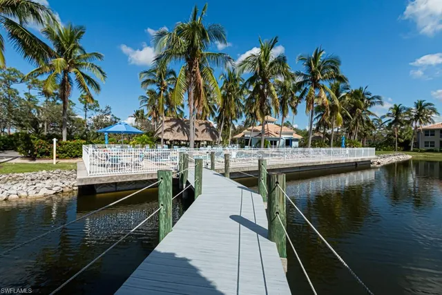 a terrace with outdoor seating and water view