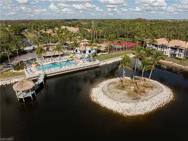 a swimming pool view with a lake view